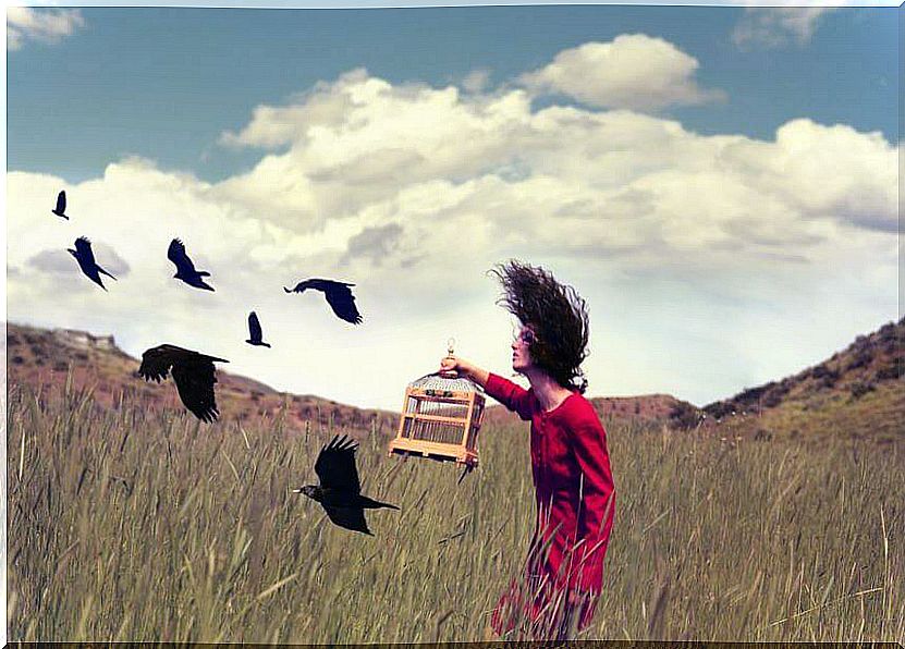 woman-releasing-birds