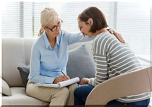 psychologist consoling patient