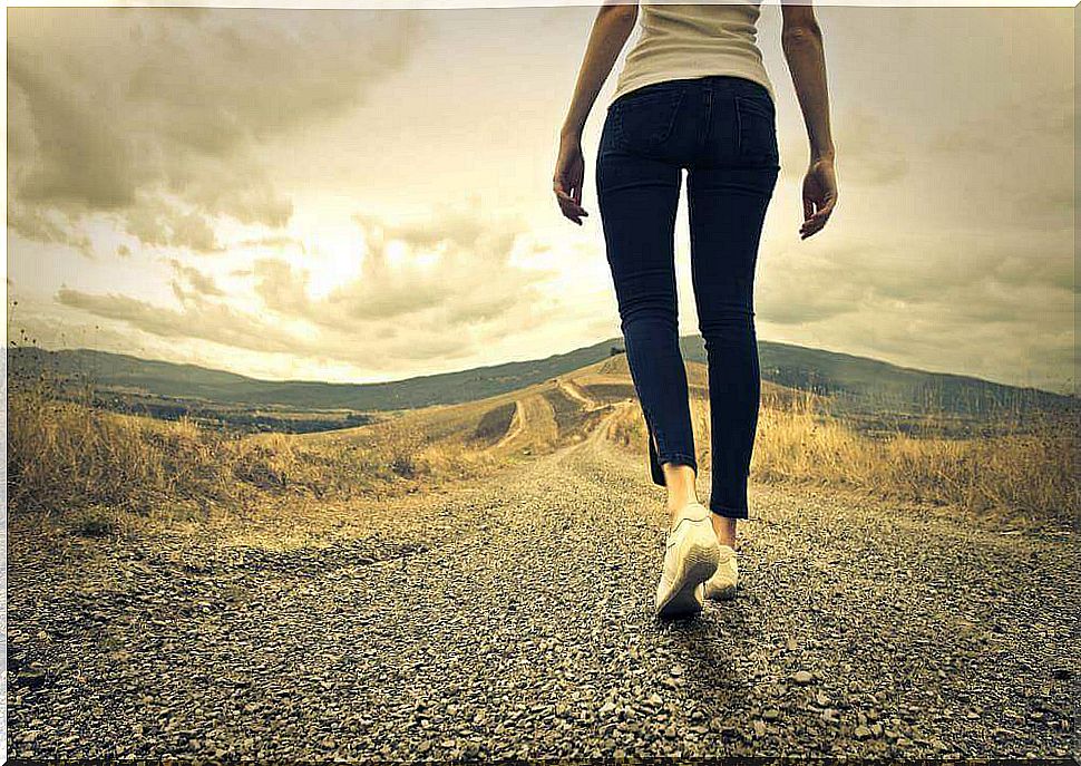 woman walking on the road