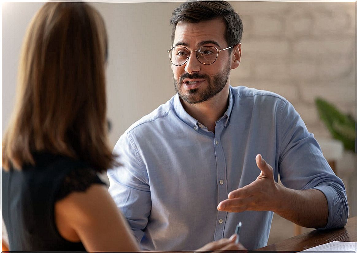 man and woman talking