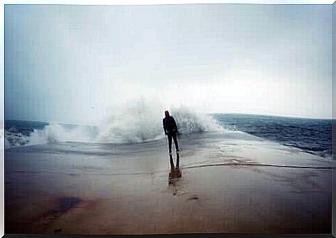 man looking at the sea