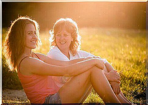 mother and daughter in the field in the sun