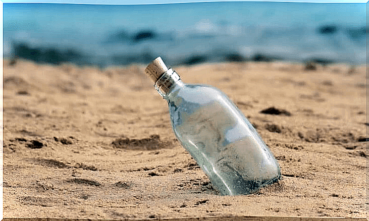 glass bottle in the sand