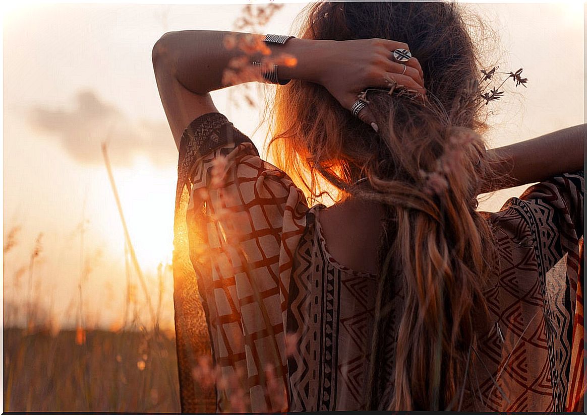 woman thinking in the middle of nature