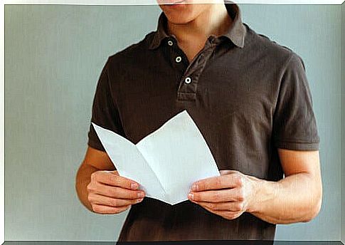 man reading ballot