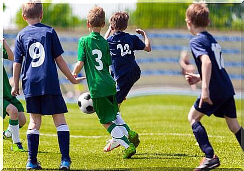 children playing football